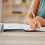 Writing in Notebook